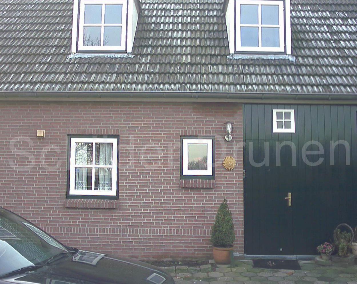 Boerderij in Drunen, geschilderd in rustiek groen en wit